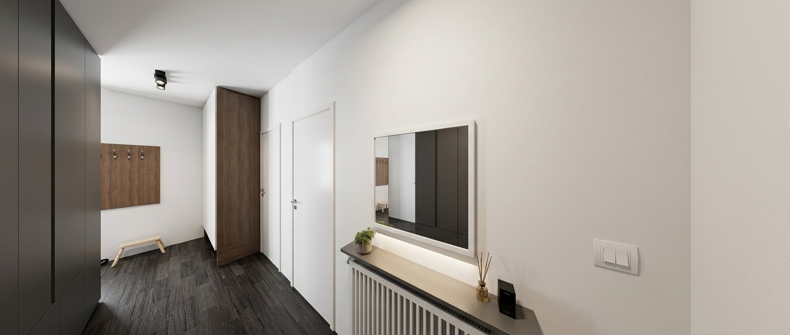 Moderni apartman — predsoblje sa ogledalom i garderoberom
